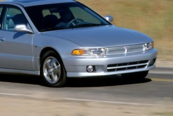 13 549 р. Передний бампер TYG (USA) Mitsubishi Galant 8  дорестайлинг седан (1996-1998) (Неокрашенный). Увеличить фотографию 1