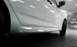 3 599 р. Комплект накладок Sport на пороги автомобиля  Hyundai Solaris ( 1 седан,  1 хэтчбек,  1 хэтчбэк) (2010-2017) (Неокрашенные). Увеличить фотографию 1