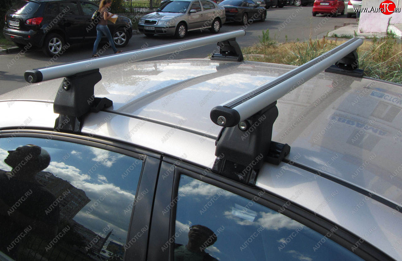 2 999 р. Багажник на крышу INTER D-1 (в обхват дверного проема) Renault Megane седан  дорестайлинг (2002-2006) (Cтальные поперечины длиной 1200 мм, без обтекателей)