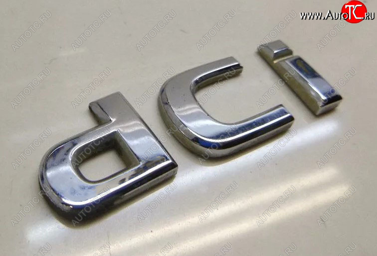 999 р. Эмблема крышки багажника dCi ГАЗ 24 Волга седан (1985-1993) (Хром)